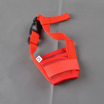 adjustable dog muzzle with secure nylon straps.